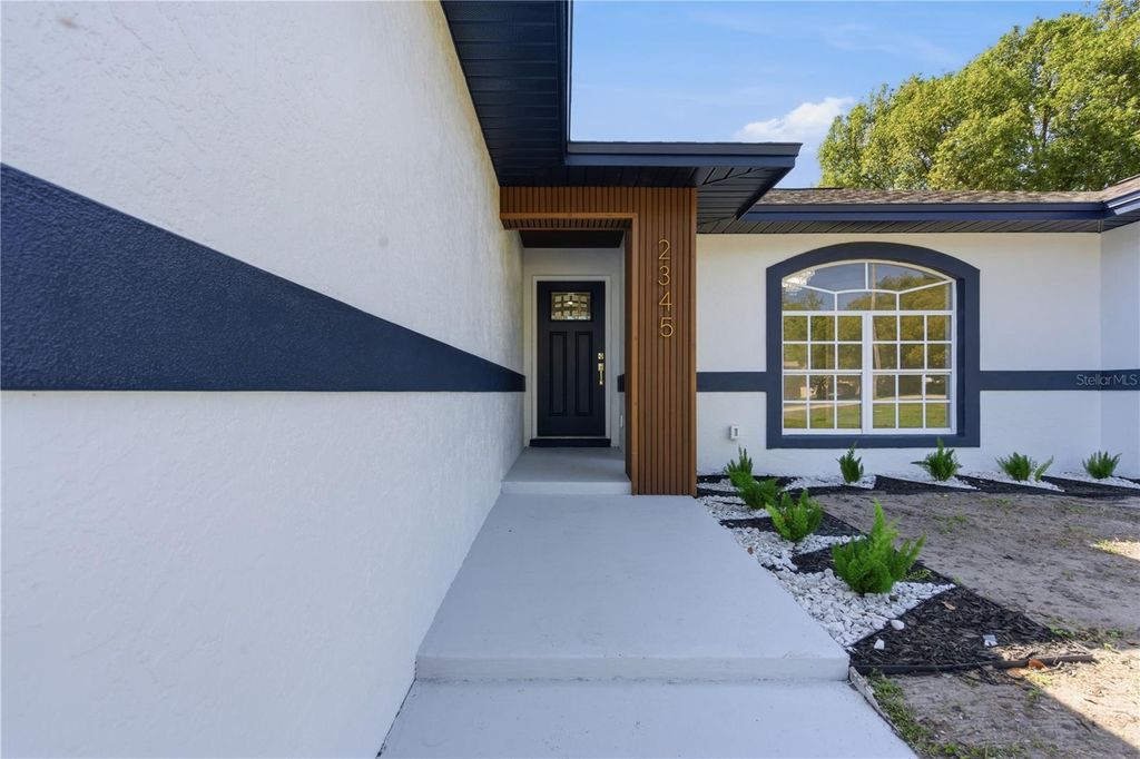 Photo of 2345 Eastmeadows Court, Lakeland, FL 33812 (MLS # TB8486916)