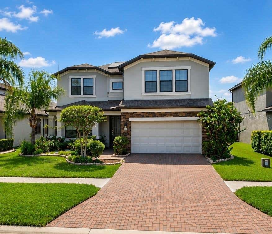 Photo of 19129 Long Lake Ranch Boulevard, Lutz, FL 33558 (MLS # TB8535427)
