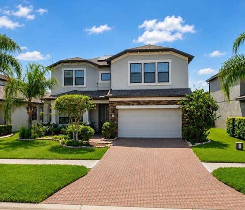Photo of 19129 Long Lake Ranch Boulevard, Lutz, FL 33558 (MLS # TB8535427)
