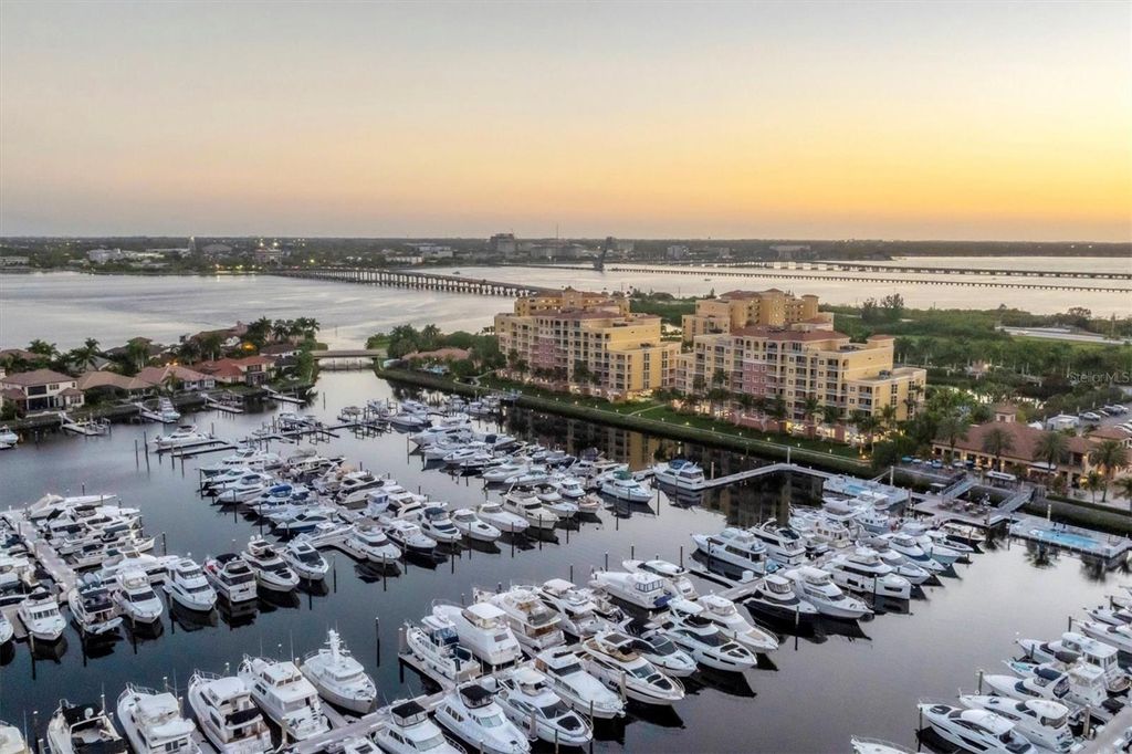 Photo of 606 Riviera Dunes Way #604, Palmetto, FL 34221 (MLS # O6343909)