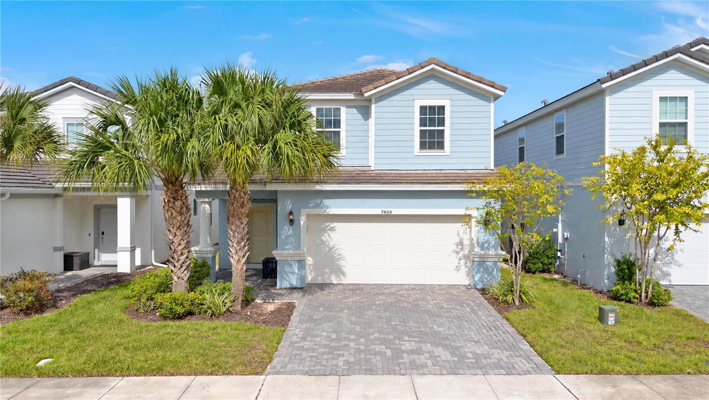 Photo of 7400 Oakmoss Loop, Davenport, FL 33837 (MLS # O6450882)