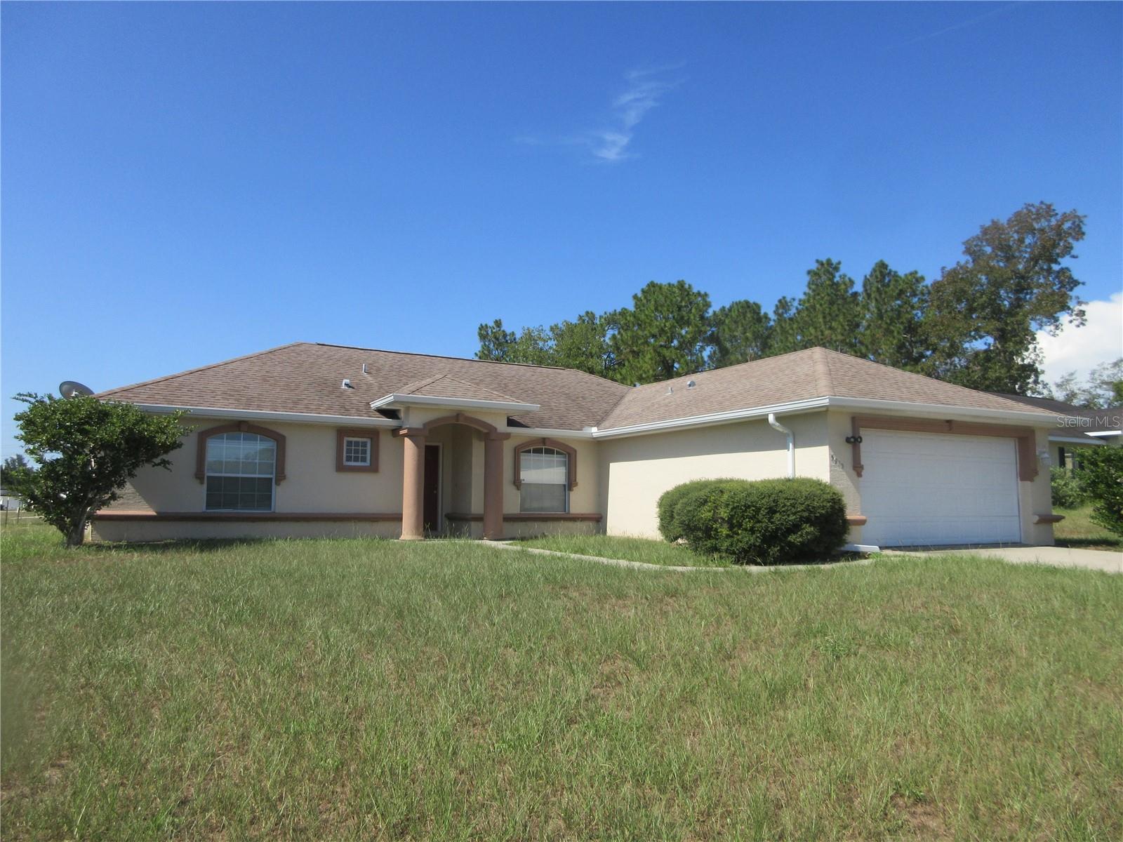 Ceramic Tile Throughout Home, Master Bath has Jacuzzi Tub and a Walk In Shower, Sits on a Corner lot.