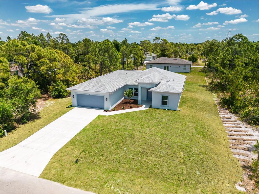 Photo of 102 Chickering Street, Port Charlotte, FL 33954 (MLS # TB8503876)