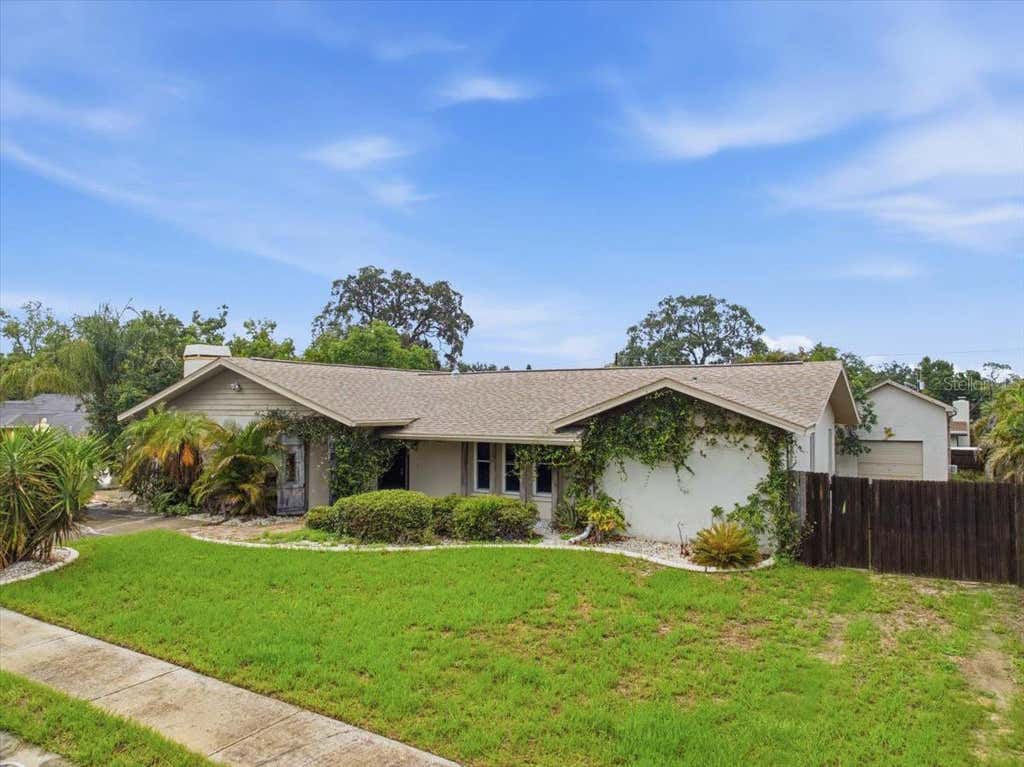 Photo of 1221 E Lime Street, Tarpon Springs, FL 34689 (MLS # TB8535324)