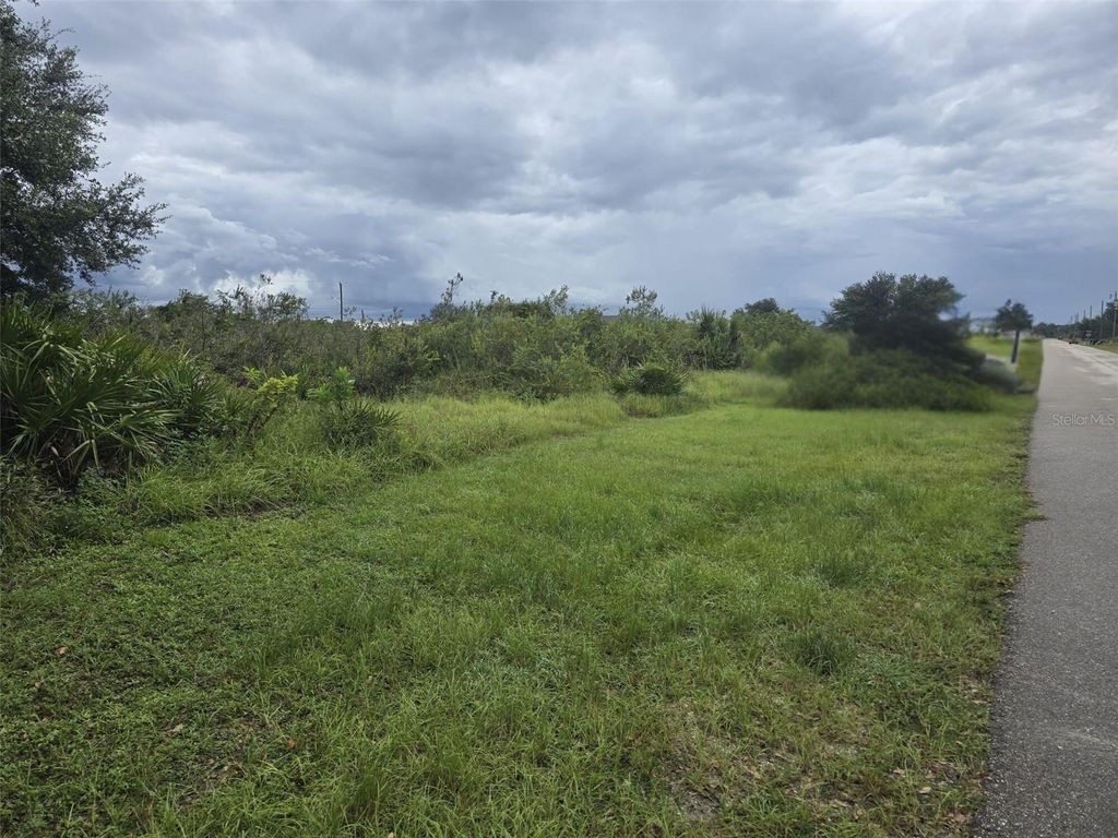 Photo of 2605 70th Street W, Lehigh Acres, FL 33971 (MLS # TB8472941)