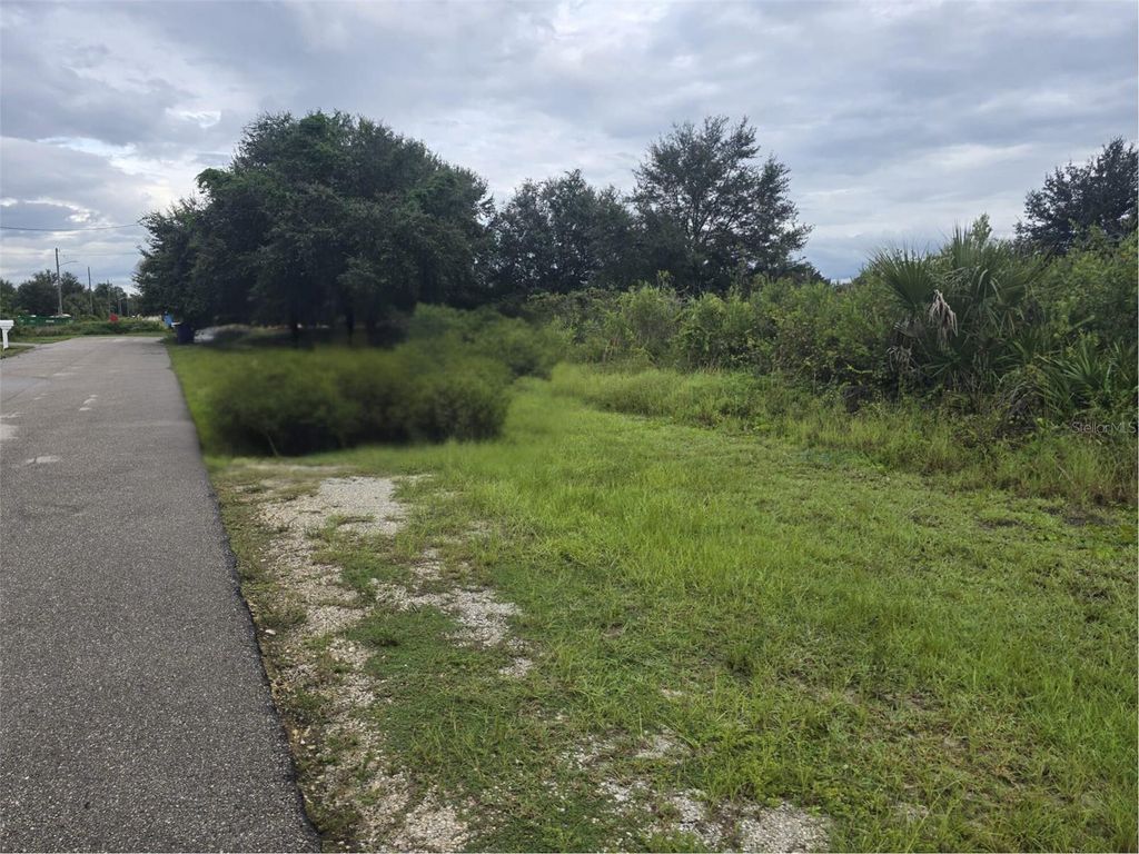 Photo of 2605 70th Street W, Lehigh Acres, FL 33971 (MLS # TB8472941)