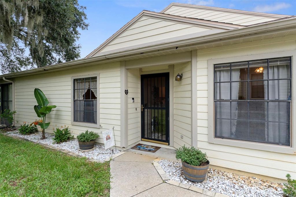 Photo of 76 S Heron Creek Loop, Inverness, FL 34450 (MLS # OM709696)