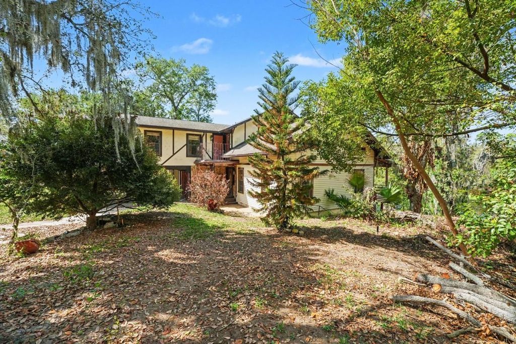 Photo of 960 Lake Cove Trail, Lakeland, FL 33813 (MLS # A4686664)