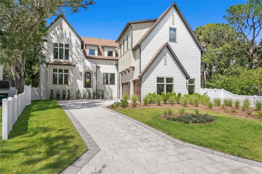BRAND NEW CONSTRUCTION JUST COMPLETED! This Modern Tudor Custom Spec Home is unlike anything you've ever seen before, nestled in the charming neighborhood of Sunset Park offering a unique blend of classic elegance and simplistic design. This 5 bedroom, 4.5 bathroom plus two bonus rooms and private pool residence is tailored for both comfort and style. The architecture stands out with its distinct combination of Tudor influences , featuring steeply pitched roofs, decorative half timbering, and expansive windows all reimagined with modern touches that seamlessly integrate into the landscape. Inside, you'll be impressed with the open-concept layout creating a perfect flow between living spaces while the high end finishes and bespoke details elevate the homes aesthetic. Step into the gourmet kitchen equipped with top tier appliances and custom cabinetry, which is ideal for both everyday living and entertaining. The living and dining rooms are bathed in all natural light. Upstairs you'll find the primary suite which serves as a private retreat, complete with a spa like ensuite bathroom, while the additional bedrooms and bonus loft offer ample space and style. Outside you'll find a summer kitchen and private pool/spa perfect for outdoor gatherings. This home represents the perfect fusion of timeless design and modern luxury, creating an exceptional living experience in one of the best neighborhoods in all of South Tampa. Located close to Tampa International Airport, Shops, Restaurants and so much more.