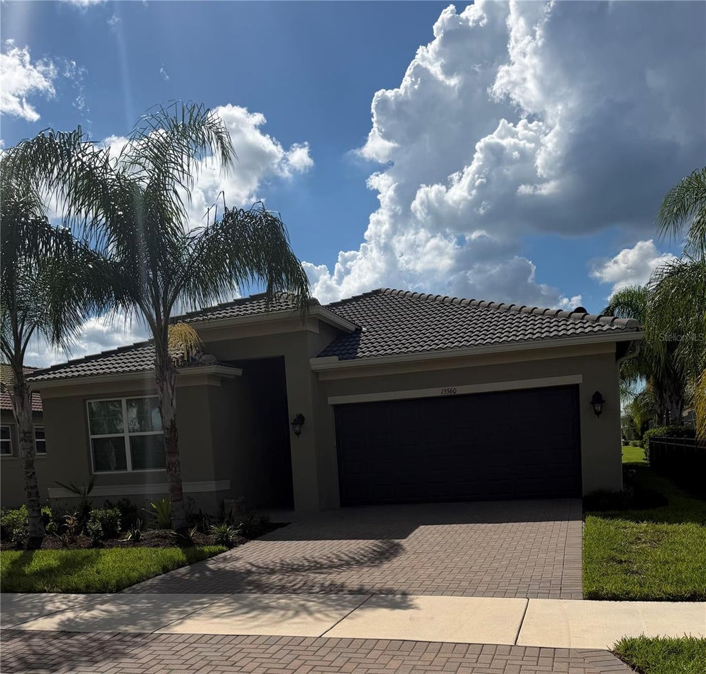Photo of 15560 Santa Pola Drive, Wimauma, FL 33598 (MLS # J1005410)