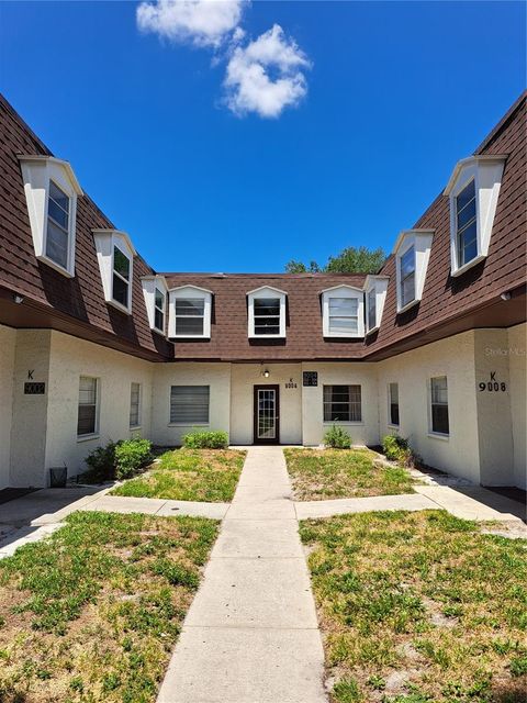 Photo of 9004 Tudor Drive #K103, Tampa, FL 33615 (MLS # TB8428687)