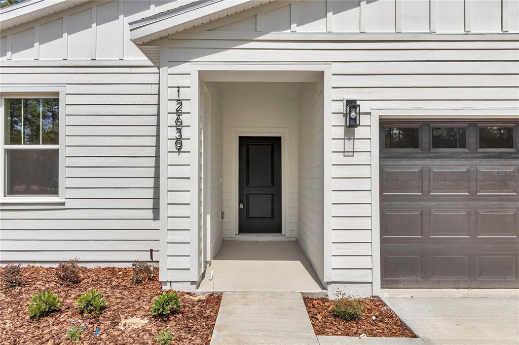 Photo of 12639 SW 78th Place, Dunnellon, FL 34432 (MLS # O6286870)