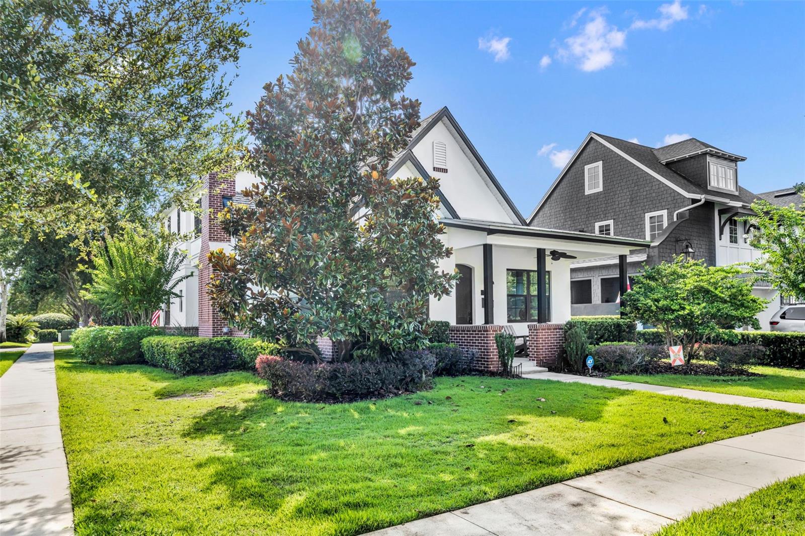 Discover this stunning, custom-built home nestled on a tranquil, tree-lined street just steps from all the charm of Winter Park’s renowned Park Avenue. Located in a peaceful neighborhood, this elegant residence combines sophisticated craftsmanship with luxury features throughout its expansive 2,860 square feet of thoughtfully designed living space.
Relax on the charming front covered porch, the perfect spot to enjoy your morning coffee. Step inside to find meticulous attention to detail—from stunning wide white oak floors to exquisite custom millwork and soaring ceilings that create an airy, welcoming atmosphere.
The chef-inspired kitchen is the heart of the home, featuring an abundance of custom solid-wood cabinets, gleaming quartz countertops, and a large island with seating for four. A generous walk-in pantry with custom shelving and top-of-the-line Thermador stainless steel appliances—including a 6-burner gas stove, double oven, and deep farm sink—make meal preparation and entertaining effortless. Adjacent to the kitchen, a charming dining area is perfect for memorable dinners, while the adjoining family room boasts a soaring cathedral ceiling, a natural gas fireplace with a custom stone mantel, and large windows that flood the space with natural light.
A cozy private den offers an ideal retreat for work or relaxation. On the opposite side of the first floor, you'll find a guest suite with a private bath, two additional bedrooms with custom closets, a stylish full bath, and a laundry room with ample storage and a utility sink. The spacious mudroom, accessible from the two-car garage, provides practical storage with built-in cabinets and hooks.
Upstairs, the luxurious primary suite features a spa-inspired bathroom with double sinks, custom Restoration Hardware cabinetry, elegant lighting, and a large walk-in shower. A peaceful sitting area and a walk-in closet with custom shelving create a perfect private retreat. Additionally, an upstairs loft offers versatile space ideal for a home office, gym, or additional quiet area.
Outside, enjoy a private backyard oasis designed for relaxation and entertainment. Highlights include a “Michael Phelps Chilly Goat” hot/cold tub combo, outdoor TV, and speakers—creating your personal weekend paradise.
Additional amenities include a large two-car garage, solid-core doors, crown molding, wide base moldings, dual tankless water heaters, fully-owned solar panels (reducing energy costs), a water softener and purifier, new exterior paint (2023), professionally installed closet shelving (2023), and professionally landscaped gardens.
Flooded with natural light and warmth, this exceptional home offers a cozy yet elegant atmosphere. Zoned for top-tier schools—including Winter Park High School—and conveniently located near Lake Highland, Trinity Prep, the Winter Park YMCA, Racquet Club, and Interlachen Country Club, it’s ideal for a vibrant Florida lifestyle. Walkable to Winter Park’s renowned shopping and dining destination, don’t miss the opportunity to make this exquisite property your new home!