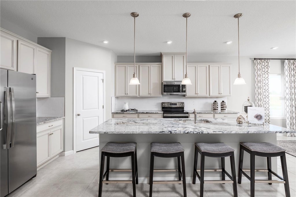 Photo of 11126 Nellie Crossing Circle, Clermont, FL 34711 (MLS # W7889651)