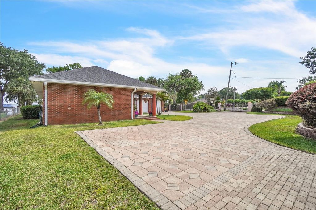 Photo of 9950 W Lake Marion Road, Haines City, FL 33844 (MLS # O6365986)