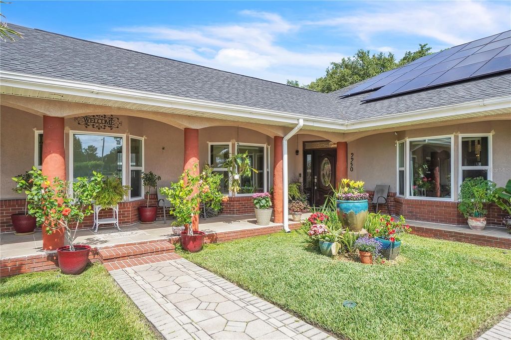 Photo of 9950 W Lake Marion Road, Haines City, FL 33844 (MLS # O6365986)