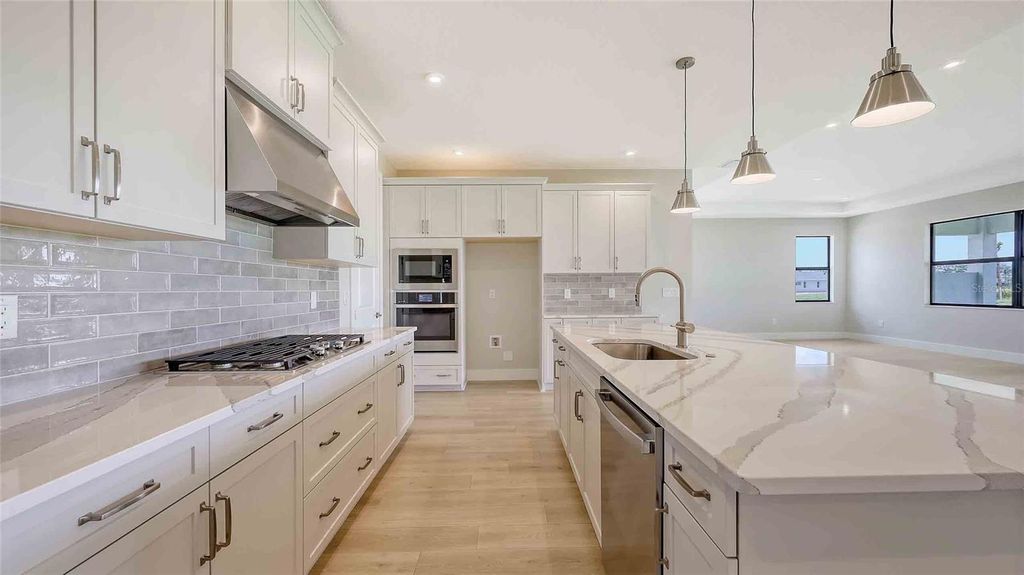 Photo of 14451 Coastal Woodland Lane, Parrish, FL 34219 (MLS # O6272174)