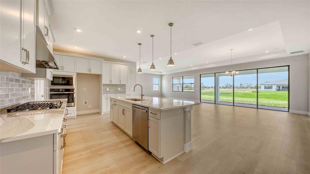 Photo of 14451 Coastal Woodland Lane, Parrish, FL 34219 (MLS # O6272174)