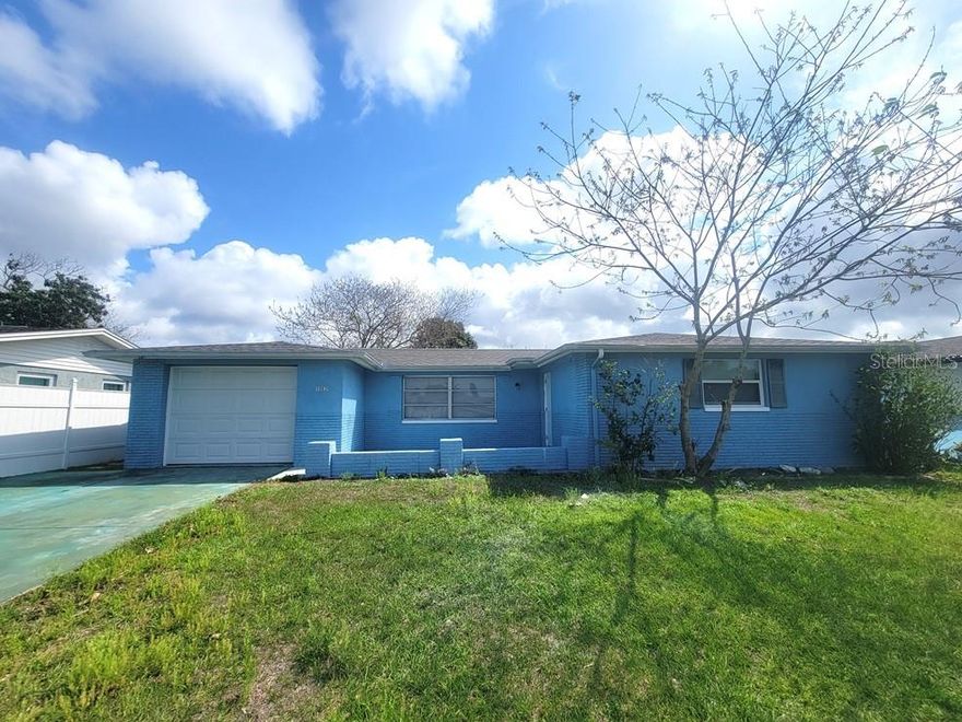 Your perfect space in Port Richey awaits! This spacious 2 bed / 2 bath home offers an open, airy layout with stylish updates throughout. You’ll love the large kitchen with granite countertops, sleek vinyl flooring (no carpet!), and a convenient indoor laundry room. Both bedrooms feature oversized walk-in closets, while the primary suite boasts a beautifully updated private bath. Need extra space? The bonus room is perfect for a home office, guest room, or flex space! Enjoy Florida living with a huge screened-in patio, charming front porch, extended driveway, and one-car garage. Pet friendly (breed restrictions apply)—bring your furry friend and make this home yours!