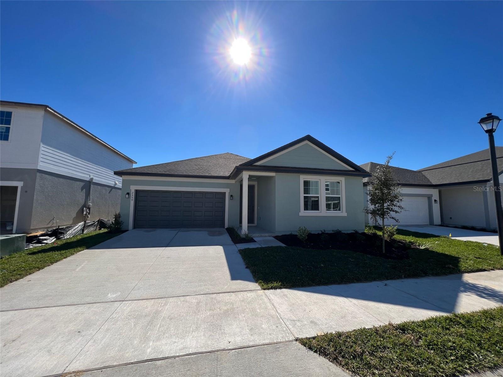 Don’t miss this unique opportunity in one of the best locations in Central Florida!, This beautiful upgrade 4-bedroom, 3-bathroom home, built in 2023, is approved for both short-term and long-term rentals and offers exceptional income potential where is in Champions Gate area, this home is just minutes from world-class golf courses, and the Disney Parks—making it a strategic choice for investors and vacationers. Designed with elegance and functionality, It upgraded LED lighting, and premium tile flooring throughout. The gourmet kitchen boasts quartz countertops, upgraded cabinetry, a stylish backsplash, and pendant lighting over the island. Enjoy breathtaking conservation views from the extended French doors leading to the private backyard. Located in the Glen at West Haven, a community with resort-style amenities including a pool and gym, and featuring a low HOA, this home is excellent as a high-performing rental or a dream primary residence.