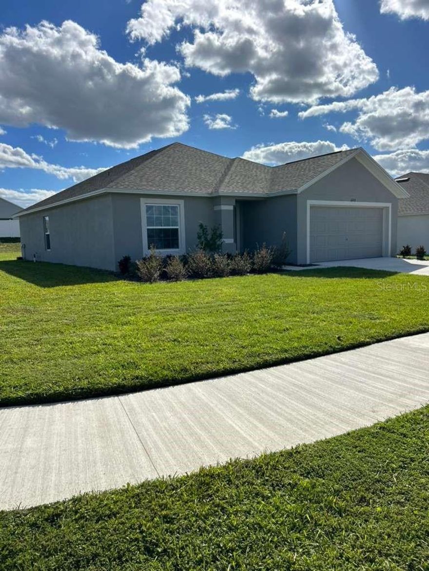 Experience the feel of a brand-new home in this spacious 3-bedroom, 2-bath residence. The home features hard surface flooring throughout. The modern kitchen offers a large center island, stainless steel appliances, hard surface countertops, abundant of sleek design cabinet space, pantry.Living room Dining room combo with recessed lighting with open space enhances the home’s open and airy feel, while hurricane-rated windows provide added safe