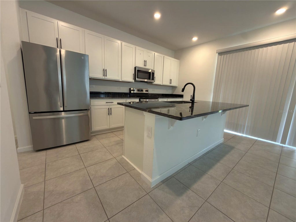Photo of 1071 Sugarwood Street, Davenport, FL 33837 (MLS # S5158878)