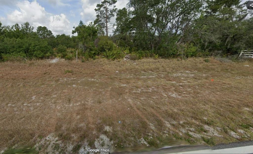 Photo of 10657 S Orange Blossom Boulevard, Sebring, FL 33875 (MLS # O6357033)