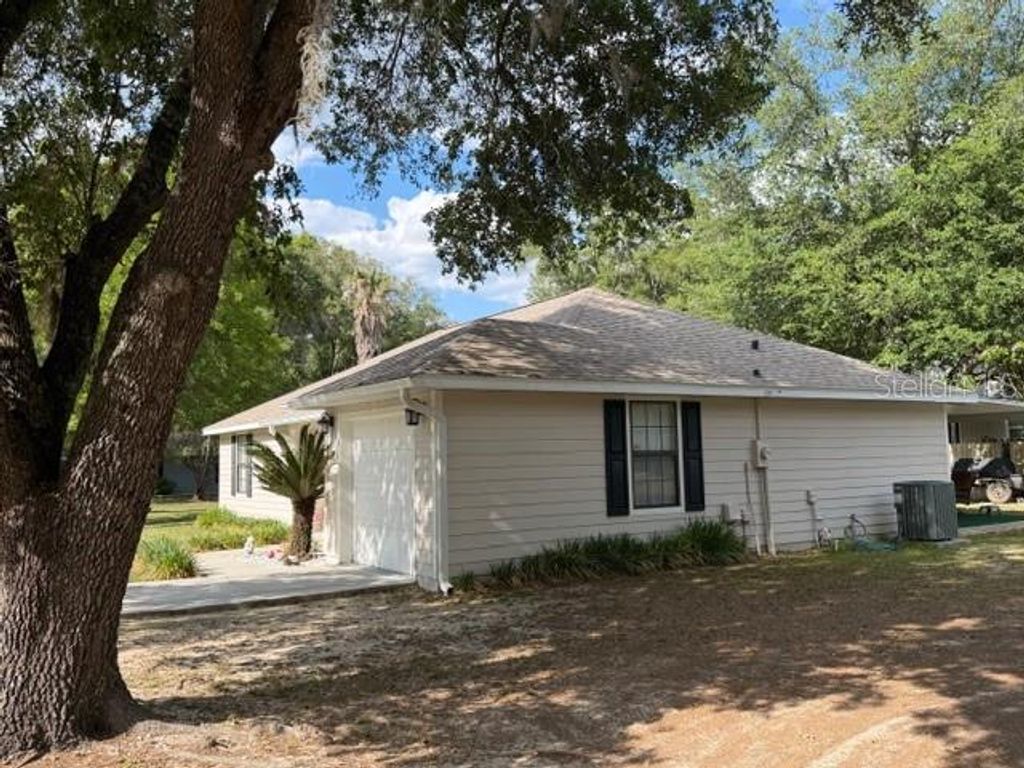 Photo of 109 NW 264 Street, Newberry, FL 32669 (MLS # GC539850)