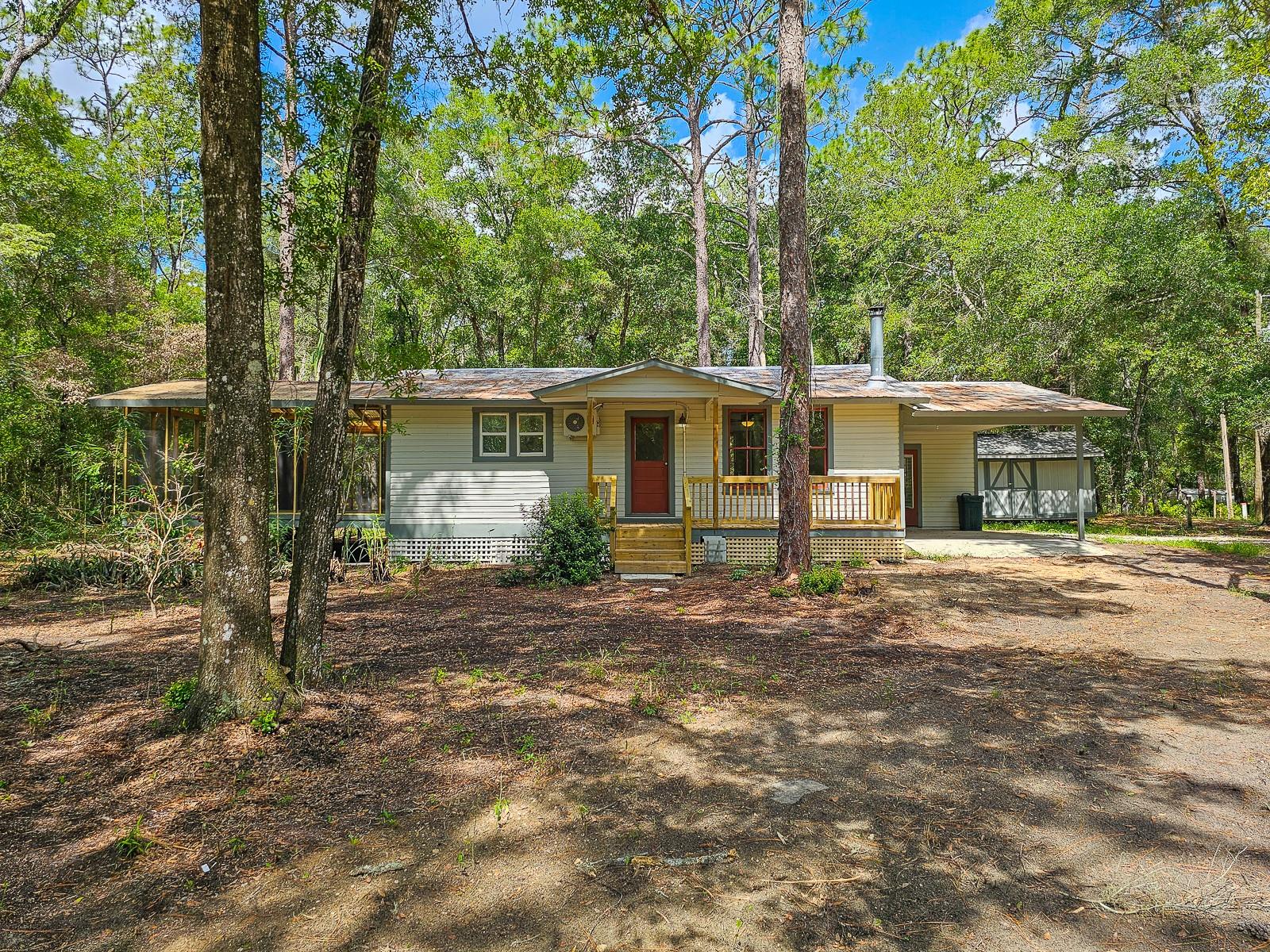 Step into this beautiful 2/1 bungalow close to Historic Melrose. This home has been beautifully updated with modern upgrades while preserving the historic charm. New renovated kitchen with a breakfast bar. A completely remodeled bathroom. New plumbing and newer electric. Original, hardwood floors. Wood Buring stove, that works. Utility room with washer and dryer connections. Brand new air split units. This bungalow is situated on a half-acre of property. A huge, screened side porch. The outdoors has been left natural. There is ample space for a patio, garden, or any outdoor features. An opportunity for the buyer to create they're on private oasis. Short drive to St. Augustine, Orange Park, Jacksonville and Gainsville. This updated country bungalow is ready for you to move in and a rare find. Come and take a tour.
Private Remarks: There is no lockbox on the doors. Enter through the carport door. Combination on door please check showing time for the combo. Please make sure sliding glass doors are locked.