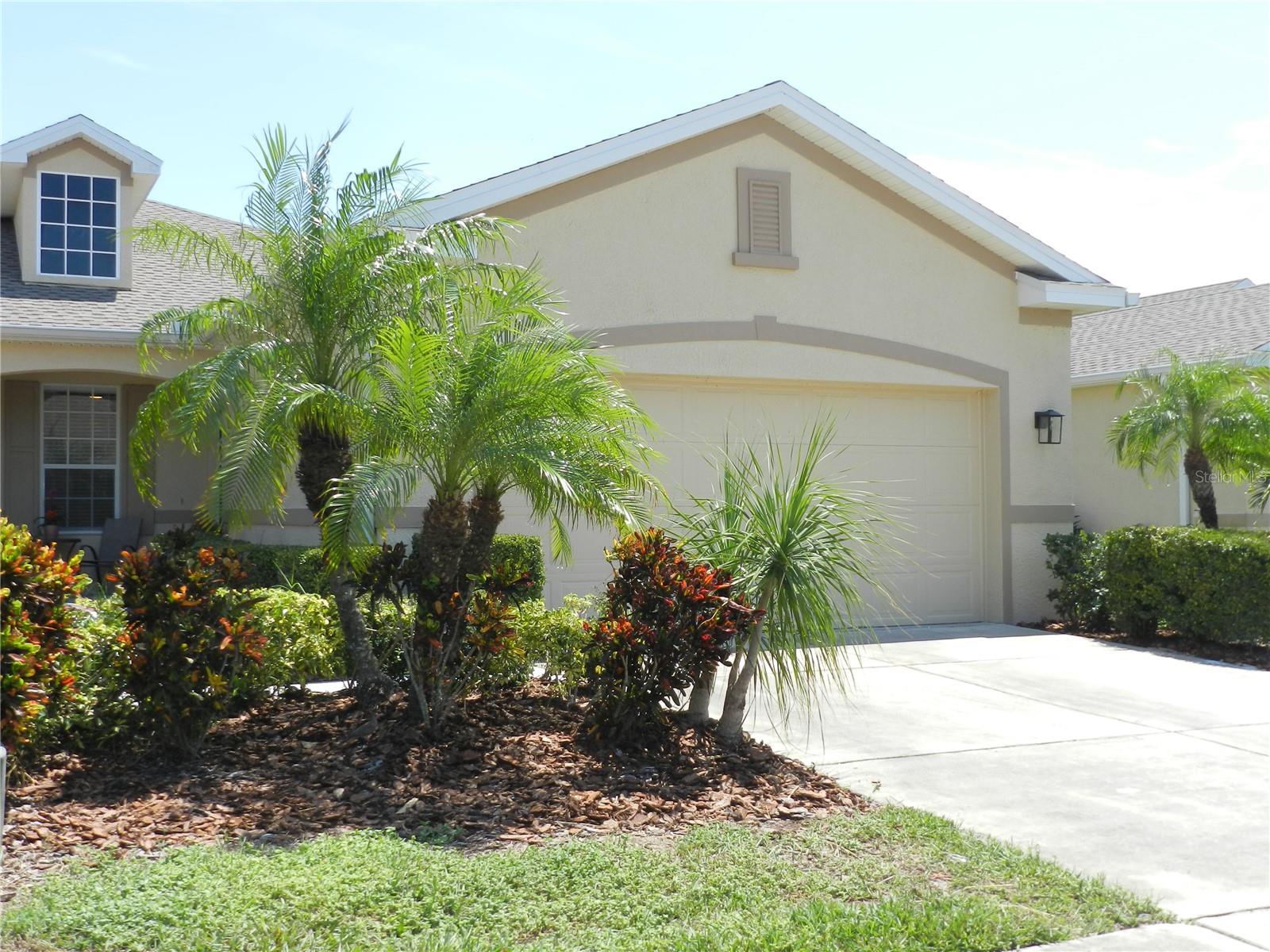 Staged. Affordable living at Gulfwinds. 3 bedroom, 2 bath 2 car garage Villla ready for occupancy. New roof, new interior paint, solid wood 42"cabinets, all new stainless steel appliances, recessed lighting, all new ceiling fans and lighting throughout. New plank vynal flooring. Kitchen has a large pantry and loads of additional cabinets for storage ans a convenient breakfast bar. New 5 1/4 baseboard throughout. Huge master bath with an oversized walk in closet and double vanities and separate shower and soaking tub. Inviting enclosed screened in lanai of the living room overlooking the fenced backyard. Inside laundry room with new full size washer and dryer. Resort style living as the exterior painting, roofs, community pool and lawn care is included in the low monthly dues that also include cableTV and internet. Located close to schools, shopping, Tarpon Springs. restaurants, the sponge docks, marinas, Anclote River, park and the bike trail. All room dimensions are estimated. The buyer should measure the rooms for exact sizes and verify all printed information and material shown.