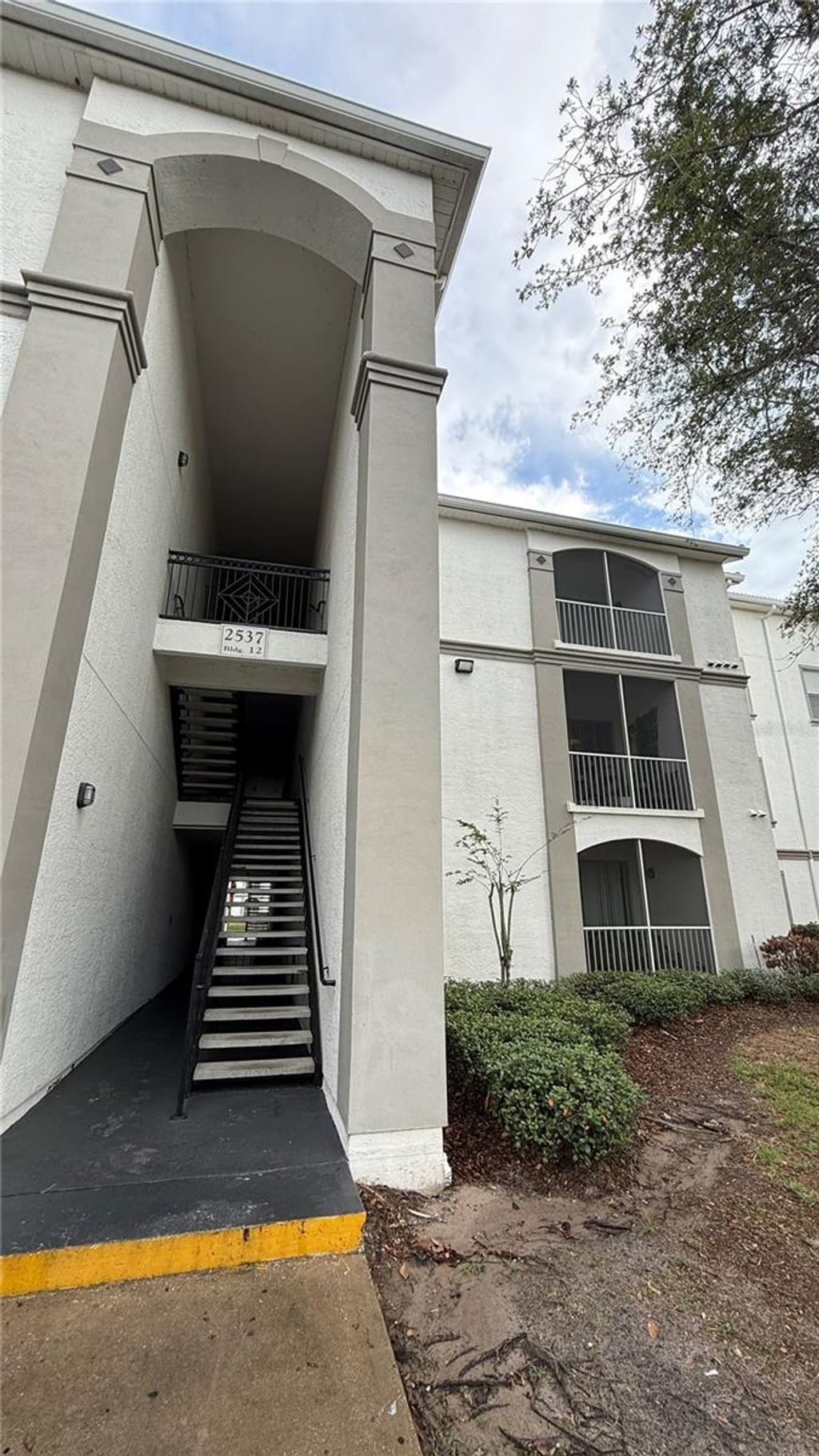 Photo of 2537 Maitland Crossing Way #303, Orlando, FL 32810 (MLS # O6380650)