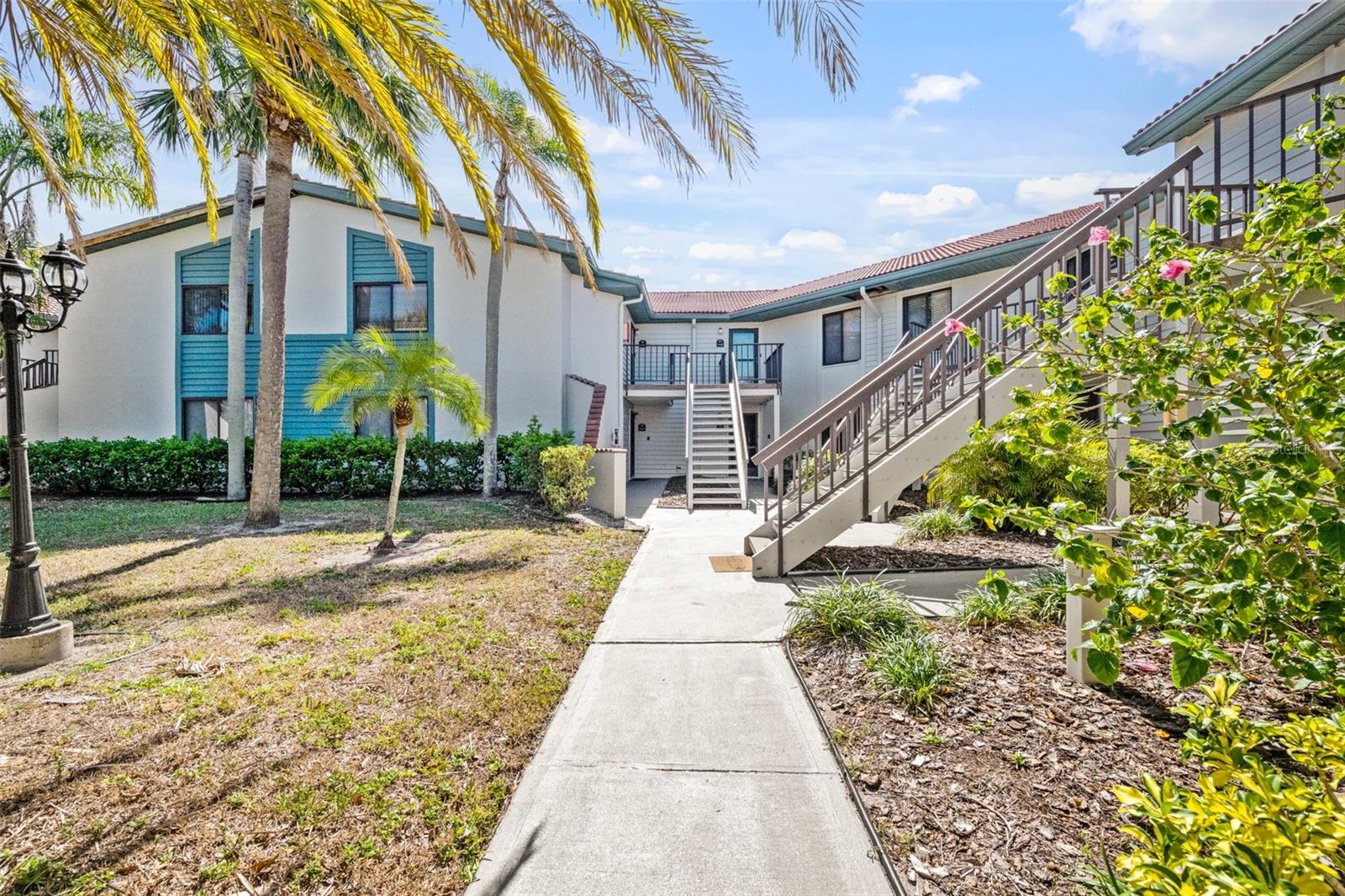 THE GREAT NEPTUNE MODEL, LARGEST FLOORPLAN AT SHOREWALK AND ONLY 16 WERE BUILT. THIS CONDO HAS BEEN A PRIVATE RESIDENCE FOR OVER 27 YEARS AND HAS BEEN LOVINGLY TAKEN CARE OF AS YOU CAN SEE IN THE PICTURES. IT HAS BEEN COMPLETELY RENOVATED WITH MODERN FURNISHINGS AND APPLIANCES. YOU CAN BUY IT AS IS, AND MAYBE ALSO BUY THAT COOL CONVERTIBLE CAR IN THE CARPORT TO GET YOU TO THE BEACH . SHOREWALK IS KNOWN ALL OVER THE WORLD, IT ALLOWS OWNERS TO RENT THEIR CONDO ON SHORT TERM SEASONAL OR LONG TERM. YOU ARE ONLY STEPS AWAY TO THE POOLS AND TENNIS COURTS. NEAR SHOREWALK YOU CAN WALK TO SHOPS, RESTAURANTS, BOWLING ALLEY, TAKE THE BUS TO THE BEACH, RIDE YOUR BIKE TO THE WELL KNOWN ROBINSON PRESERVE. YOU CAN FISH FOR SNAPPER, SNOOK REDFISH AND MANY OTHERS. ORLANDO IS 2 HRS AWAY TO DISNEY WORLD. This condo has a CARPORT, and is the Largest floorplan condo at Shorewalk and this represents an additional Property value of about $20,000 , OVER and above all other listings value at Shorewalk, this is the BEST BUY AT SHOREWALK TODAY !