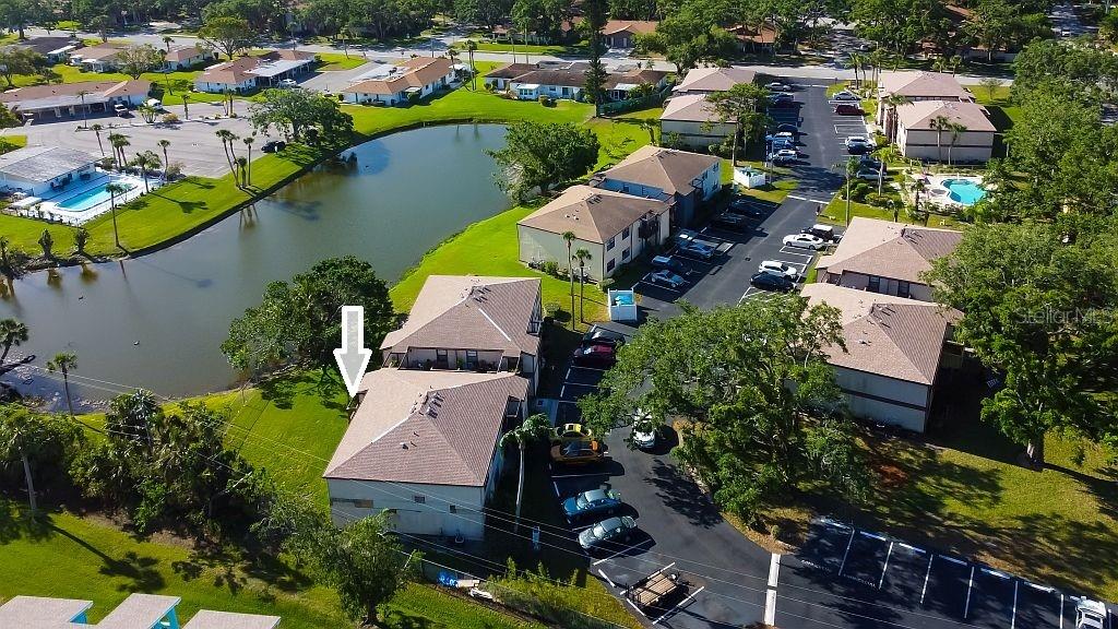 Auction Property. WELCOME TO LAKEVIEW CONDOS, a quaint community situated in the heart of Bradenton! This 2nd floor, rear corner unit, serves as a BLANK CANVAS and presents an excellent opportunity to exercise your creative vision and customize and design the perfect home to suit your lifestyle! The sliding doors open to a balcony which faces the east and overlooks a tranquil pond where you can relax and enjoy your morning beverage! The open and spacious layout features a kitchen with granite counters, separate living and dining room, inside utility room, foyer closet, plus there's a generously sized private storage room on the balcony. This building had a new roof in 2023 and is currently in process of exterior renovations. The community pool offers a calm place to escape and unwind, soak up the sunshine or cool off with a swim on warm days. Lakeview is pet friendly, allowing one small pet up to 20 lbs. and this unit includes an assigned parking space. There are no age restrictions and fees include cable, internet and trash. Investors must own for 2 years prior to leasing which makes this condo ideal for year round residents or as a vacation hideaway. This prime location is only 15 minutes from the beautiful beaches of Anna Maria Island, downtown Bradenton, Manatee Memorial Hospital and 20 minutes from Sarasota/Bradenton International Airport. It's also conveniently situated near Detwiler’s Farm Market, near several golf courses, a variety of retail and dining options and just 10 miles from I-75, and minutes away from State College of Florida and the IMG Academy. Take a short drive to Sarasota and explore St. Armand’s Circle with its unique shops and cafes or the art galleries, theaters, and fine cuisines of downtown Sarasota. It's time to relax, sit back and start living your dream!