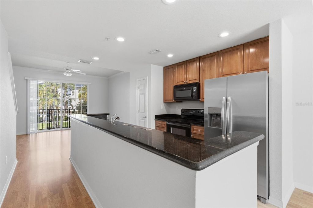 Photo of 9875 Meadow Field Circle #308, Tampa, FL 33626 (MLS # O6405005)