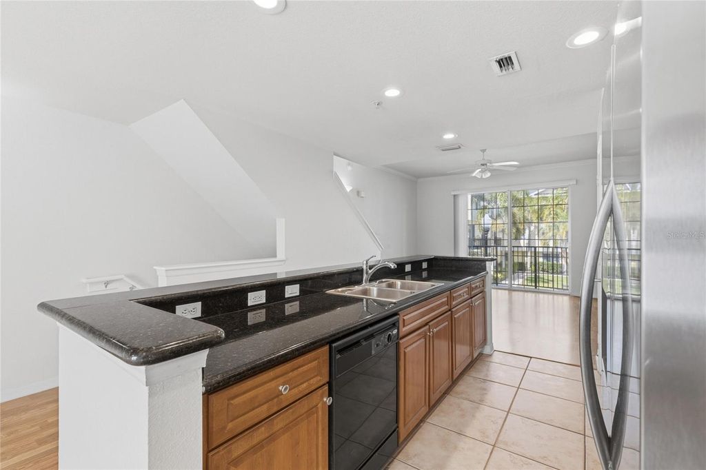 Photo of 9875 Meadow Field Circle #308, Tampa, FL 33626 (MLS # O6405005)