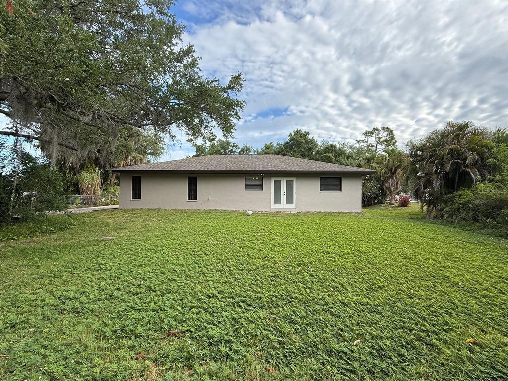 Photo of 20979 Lawson Avenue, Port Charlotte, FL 33952 (MLS # C7525310)