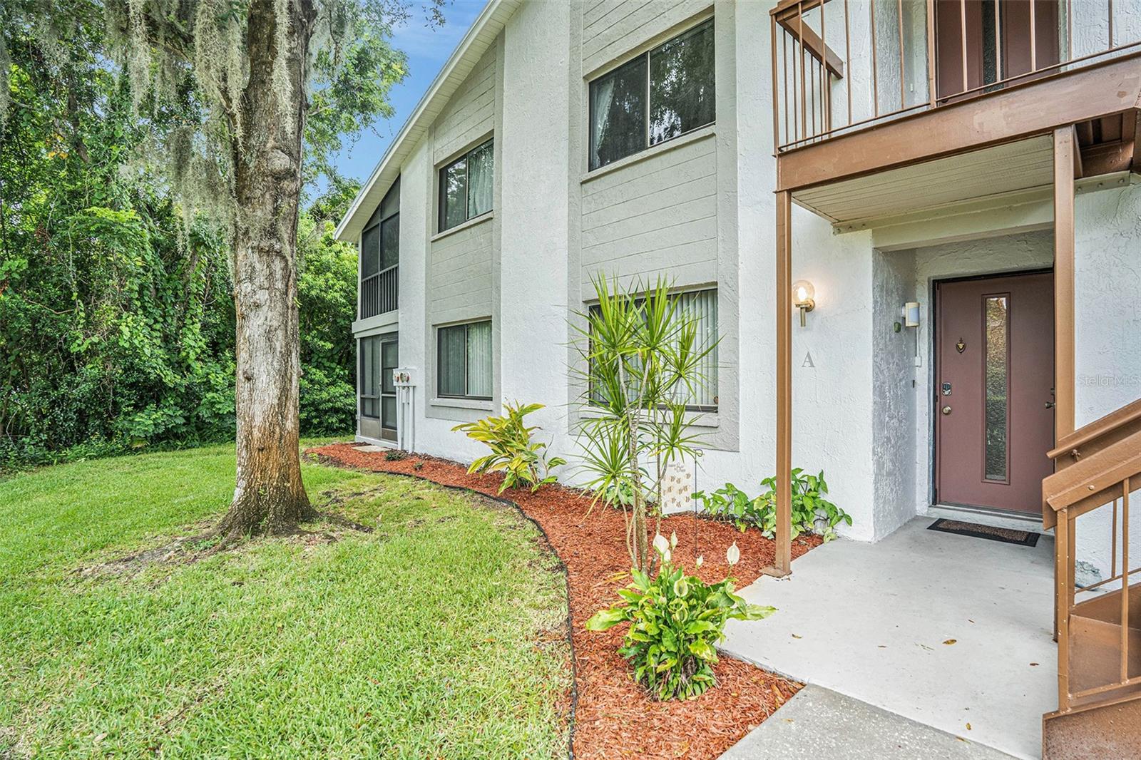 Welcome to this beautifully maintained furnished 2 bedroom, 2 bathroom first-floor condo in the desirable Eagleswood community! This split-bedroom floor plan offers both comfort and privacy, featuring an upgraded tile and wood flooring throughout. The spacious primary suite includes a walk-in closet and a private bath with a standing shower. Enjoy Florida living with not one, but two outdoor spaces — a screened lanai with epoxy flooring and no rear neighbors for added privacy, plus an additional patio off the kitchen with sliding glass doors. Ceiling fans are installed throughout the home, and all appliances, washer/dryer, and furniture convey for a truly move-in ready experience. A/C replaced in 2019, water heater in 2021. Just a short walk to the clubhouse and sparkling community pool — this is low-maintenance living at its best!