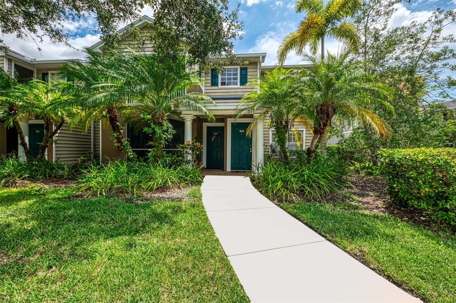 Lakewood Ranch living without CDD fees! This 2 bedroom 2 bathroom 2nd floor condo has been recently refreshed and ready for new residents. Interior recently repainted, new light fixtures and fans, new blinds, newer engineered hardwood flooring throughout, new washer, AC replaced 2019 and water heater 2018. Community amenities include pool, jacuzzi, fitness center, sand volleyball court, and clubhouse. Excellent proximity to restaurants, shopping, Waterside, Lakewood Ranch Main Street, UTC mall, as well as I75. Great opportunity for investors as 3 to 12 month leases are allowed.