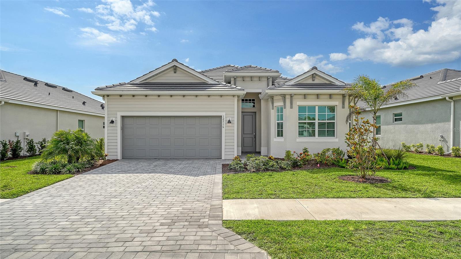 Welcome to Paradise! This lovely 3-bedroom 2-bathroom single family home is located within the gated golf Community of Wellen Park Golf & Country Club. The Angelina executive home delivers an airy open feel, with a nice floor plan designed for resort style living. Enter through the front door into an expansive great room/dining room with glass sliders leading to the spacious lanai with private heated pool and spa. The kitchen with a large island is every cook’s dream and marries the kitchen and living room. This split-plan offers privacy for owners and guests alike featuring an owner’s suite in the back of the home with two walk-in closets, a large ensuite bath with dual sinks, large walk-in shower and private entry to the lanai. As you enter the front of the home, the bedroom and the den (1 set up as an office with a queen sleeper sofa and the other offering a queen bed and TV) are located at the front of the home and share a full bath. Enjoy balmy evenings and meals on the lanai. Relax and entertain in your very own private oasis with private heated pool and spa. Hurricane impact resistant windows and doors are featured. Take your love of the game to the next level on the newest Gordon Lewis championship golf course. This Property offers the option to purchase a golf membership as well as access to resort style amenities such as main resort style pool, 3 satellite pools, fitness center, tiki bar, pickle ball, tennis courts, bocce ball, walking trails, kayak and paddle board rentals, farmers market, and more. Nearby Gulf beaches and take in a game at the new Cool Today Atlanta Braves training stadium. Enjoy resort style living in Wellen Park's newest golf Community! ***LONG OR SHORT TERM RENTAL ACCEPTED*** $12,500.00 per month DEC. ~ April** 6,000.00 per month MAY ~ NOV. $65.00 monthly min. expenditure is required at the on-site Tiki Bar/Restaurant (Alcohol Excluded). Easy access to I-75, shopping, dining, Farmers market, live music and more in downtown Wellen Park. Close proximity to the Cool Today Atlanta Braves Stadium.