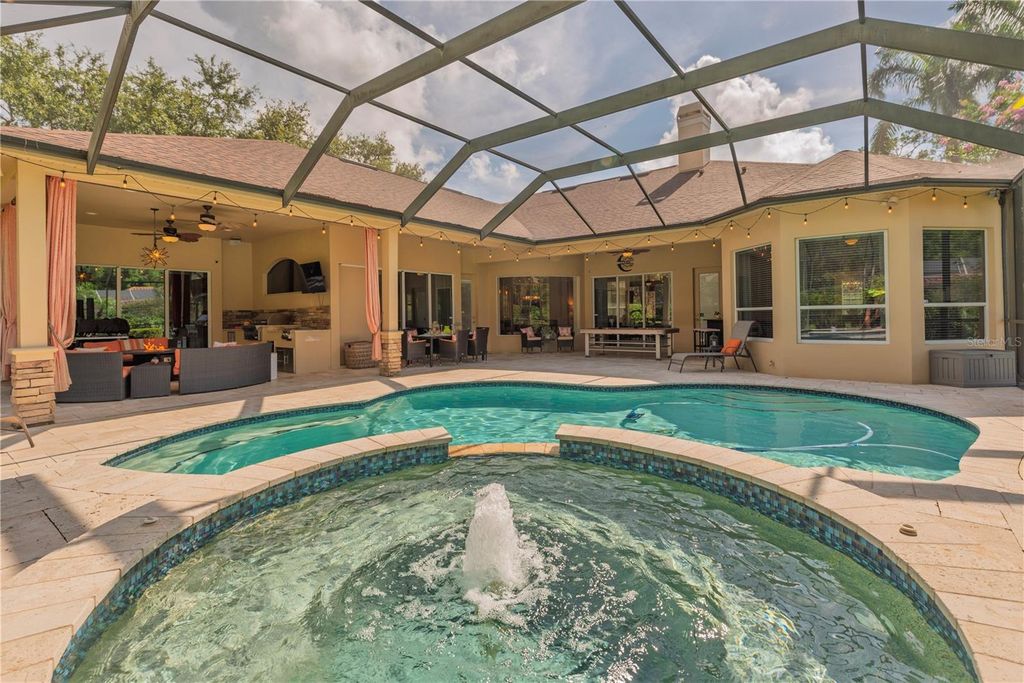 Photo of 911 Pine Lake Drive, Tarpon Springs, FL 34688 (MLS # TB8405273)