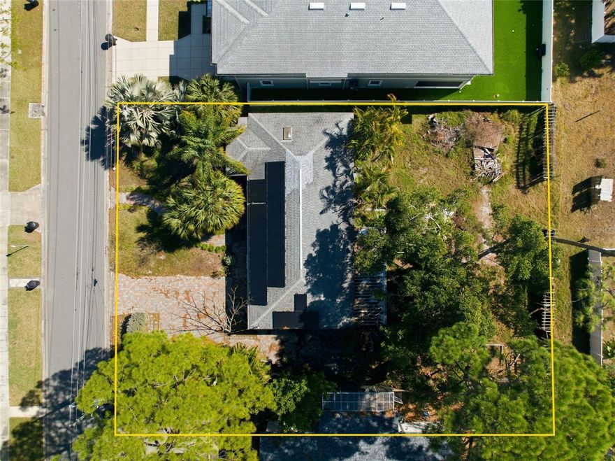 Exceptional redevelopment opportunity in highly desirable Northeast Park. This oversized NT-1 zoned double lot offers rare flexibility, including the potential to subdivide into two buildable parcels (buyer to verify with the City of St. Petersburg). Upon subdivision, each lot may allow construction of a single-family residence with a detached accessory dwelling unit (subject to City approval), creating a unique opportunity for two luxury homes side-by-side — each with multi-generational or guest house flexibility. Builders may benefit from constructing adjacent projects simultaneously, potentially improving efficiency in site work, mobilization, utilities, and scheduling. Located just off 4th Street North and approximately five minutes to Downtown St. Petersburg, the property offers convenient access to Coffee Pot Bayou, Weedon Island Preserve, shopping, dining, major interstates, and area airports. Surrounded by newer million-dollar homes, the neighborhood continues to demonstrate strong resale confidence for quality new construction. Property is located in Flood Zone AE (Base Flood Elevation 8’); new construction elevation requirements should be verified. The existing structure remains on site; however, the highest and best use may be redevelopment.