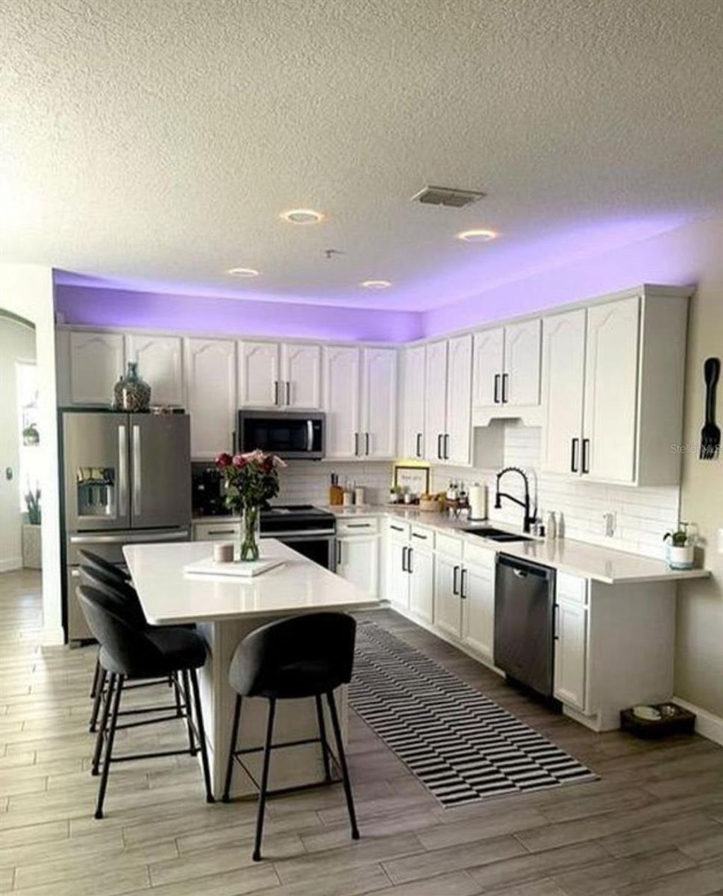 Photo of 10400 Eastpark Woods Dr, Orlando, FL 32832 (MLS # S5140406)