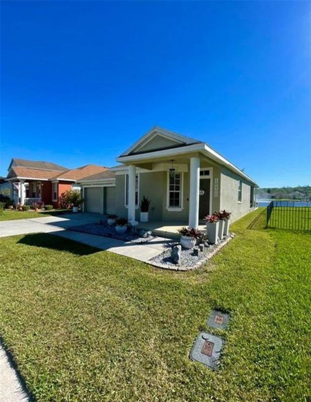 Photo of 10400 Eastpark Woods Dr, Orlando, FL 32832 (MLS # S5140406)