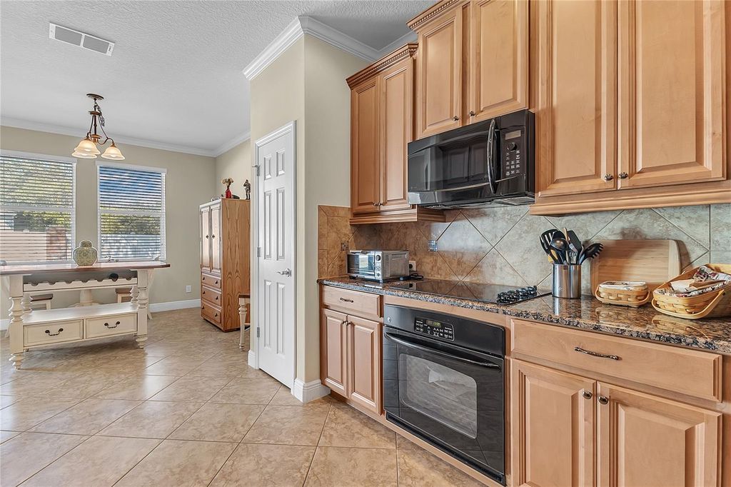 Photo of 877 Strathmore Drive, Orlando, FL 32803 (MLS # O6376261)