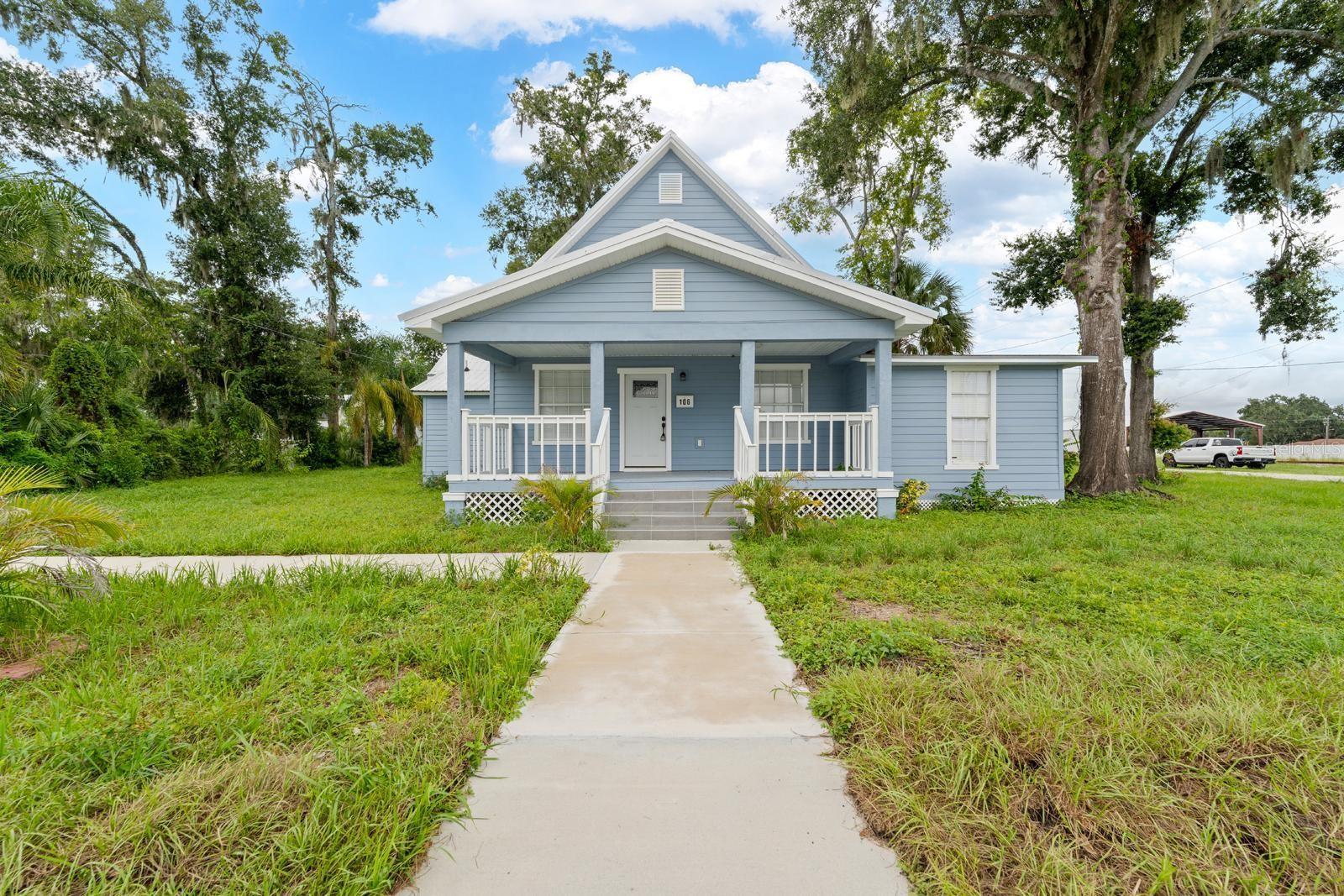 This charming home in Historical Plant City District is ready for a new owner! The home is a 5 bedroom, 3 full bath and sits on a .3 of an acre corner lot. NO HOA or CDD. Step up to your covered oversized front porch. Upon entering the home, you will notice the tall ceilings and luxury vinyl flooring throughout the common areas (this home has no carpet). The kitchen features slow close cabinets and granite countertops, and two year old appliances. The kitchen flows nicely into the oversized dining room and living room areas which can be great for entertaining. The primary bedroom has luxury vinyl flooring with ample windows for natural lighting as well as a walk-in closet with built-in shelving. The remainder of the bedrooms are located on the opposite side of the home. Two of the 4 additional rooms have a Jack and Jill bathroom with newer dual vanity and double sinks. 4th bedroom is oversized and the 5th bedroom can be used as a office, fitness room, or craft room. There is also a full third bathroom off the living room that has been updated with newer vanity, tiled shower, and toilet. The back yard features a large porch. The property has plenty of land to create your own vegetable or butterfly garden. This home also has a 2 year old metal roof with insulation! You are also centrally located - is only a few blocks from downtown and just minutes from i4! Schedule your private showing today.