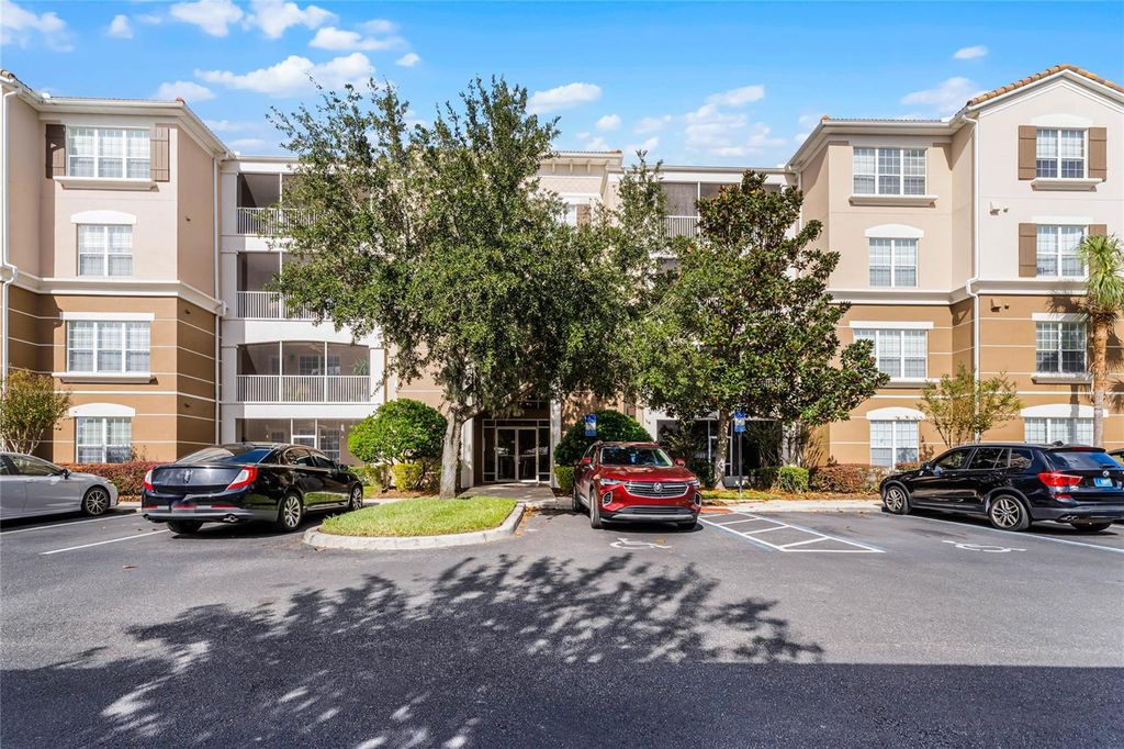 Photo of 3356 Robert Trent Jones Drive #101, Orlando, FL 32835 (MLS # O6394548)