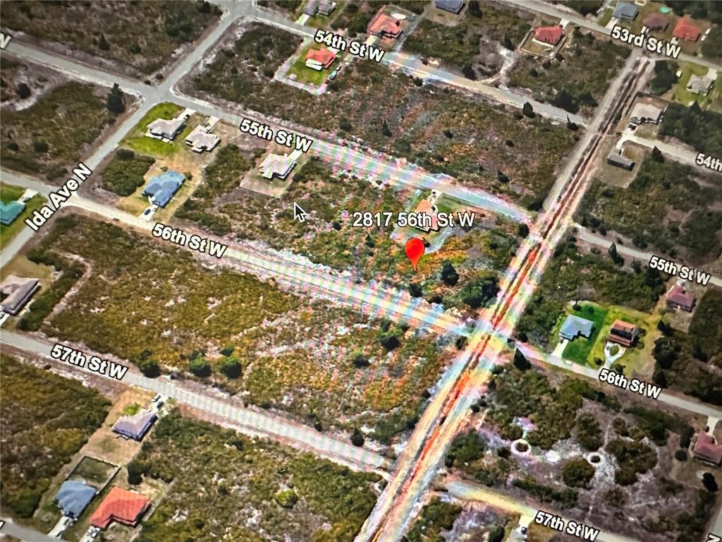 Photo of 2817 56th Street W, Lehigh Acres, FL 33971 (MLS # O6234295)