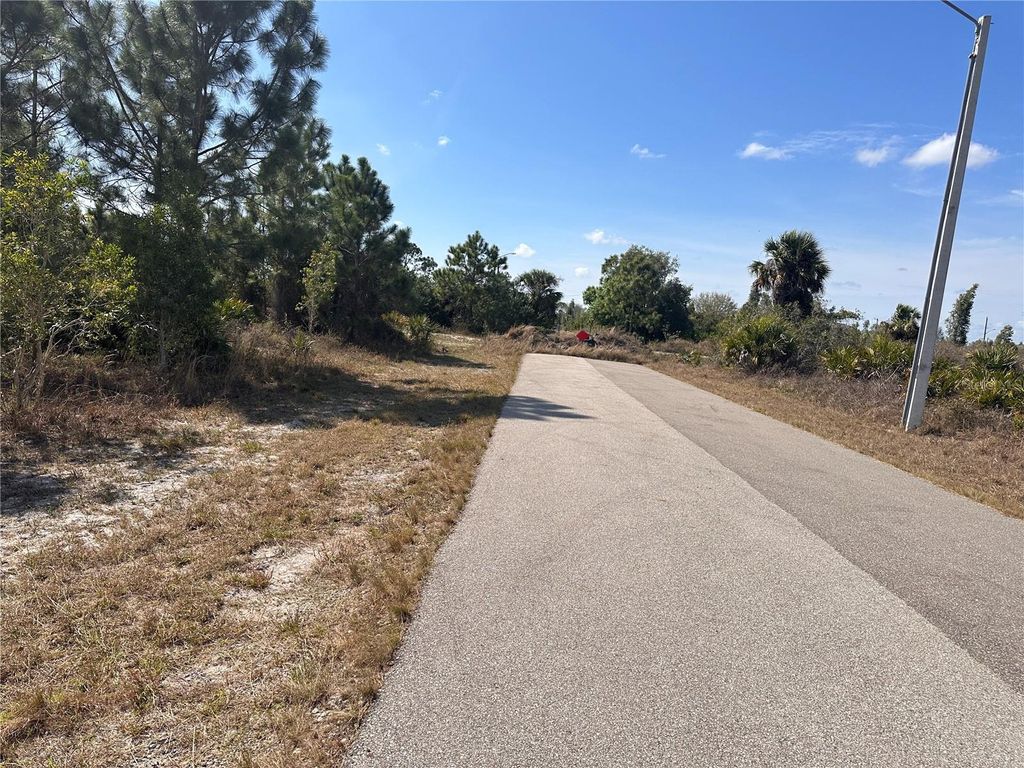 Photo of 2817 56th Street W, Lehigh Acres, FL 33971 (MLS # O6234295)