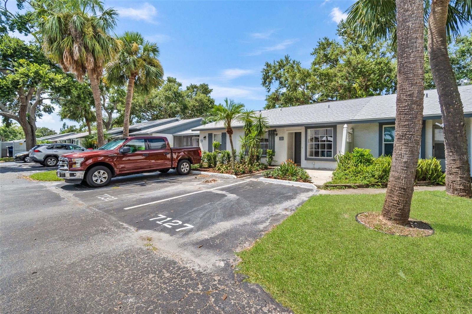 Attention first-time homebuyers, your ideal home has arrived. It was recently appraised at $289k, allowing you to walk into instant equity! A beautifully remodeled 2-bedroom, 2-bathroom villa offering a perfect blend of style, comfort, and low-maintenance living in a great St. Petersburg location. This home has been thoughtfully upgraded with luxury vinyl plank flooring, quartz countertops, and modern finishes throughout, giving you the fresh, clean look you've been dreaming of. Plus, a brand new roof, AC and water heater. The open-concept layout is great for both relaxing and entertaining, and the split-bedroom floor plan offers privacy and flexibility. Both bathrooms have been tastefully renovated, so there's nothing left to do but move in. Located in the quiet and friendly Parkside Villas community, you'll love the convenient access to shopping, restaurants, and Gulf beaches, all just a short drive away. With low HOA fees and no major repairs needed, this is a smart and stress-free way to step into homeownership.