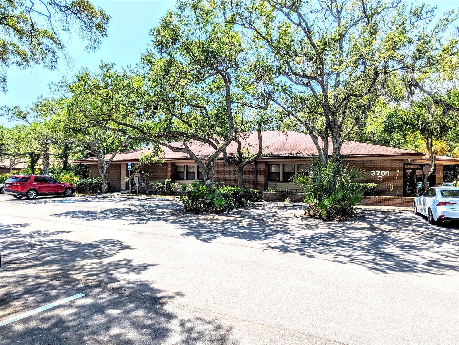 Beautiful Freestanding Office Building for Sale! Clients will enter into a spacious reception area complete with ample natural light, hints of modern flare, and white-washed brick. This building offers seven individual offices, a large conference room, two large work areas and/or cubicle areas, and an oversized breakroom.
This building is one of twelve professional office buildings situated on almost 13 Acres, in a project called Wildewood Professional Park located on the busy Cortez Road corridor in Bradenton, Florida. An Owner's Association has been set up to handle cross access easements, shared retention, landscape maintenance, signage, and entrance features allowing these buildings to be owned independently. This is not a condominium association. The building owners own their buildings and their land with restrictions that support attractive appearance and appropriate usage.
Building is also available for lease at $14.50 PSF NNN